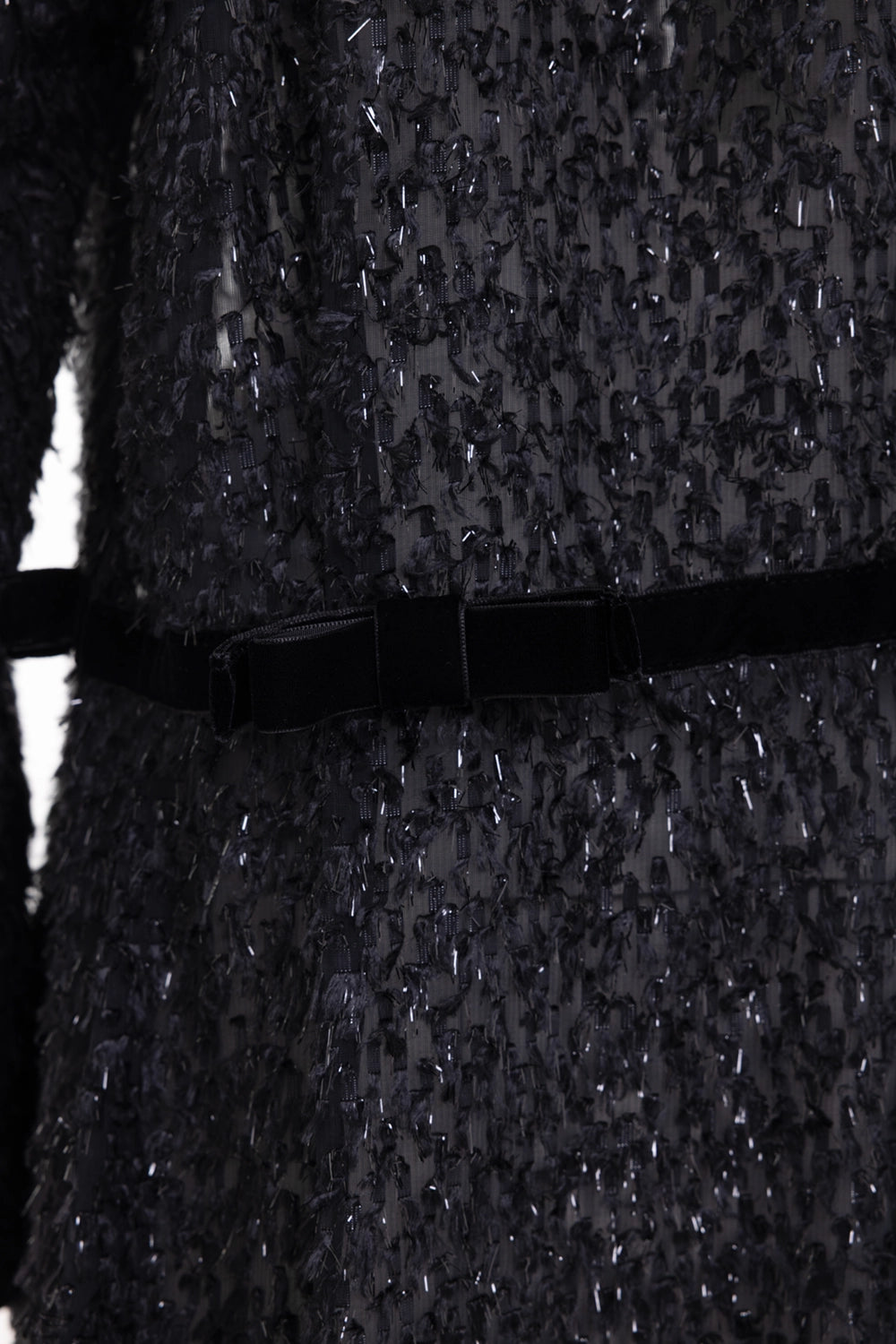 Noir Kei Ninomiya women's coat in black, fabric close-up, sequins and velvet bow trim