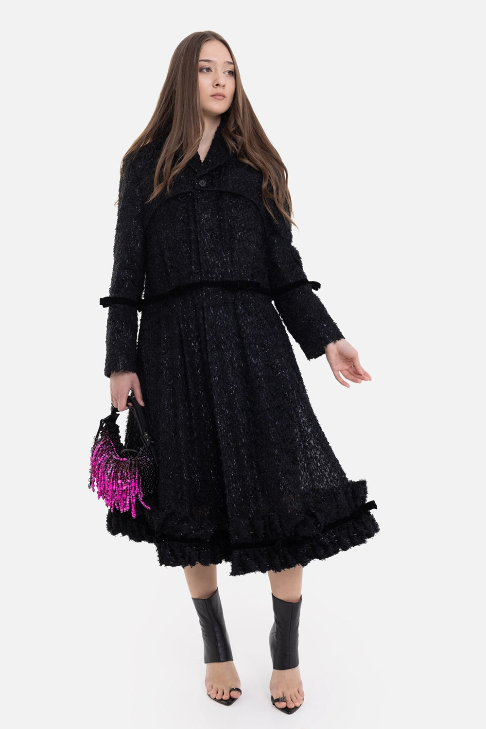 Noir Kei Ninomiya women's coat in black, on-model full-length view, flared skirt and ruffled hem