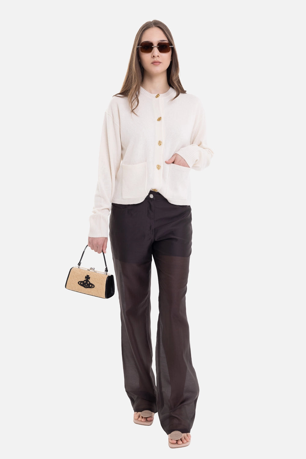 Helmut Lang women's trousers in Bistre, on-model full-length view with flared hems and visible lining