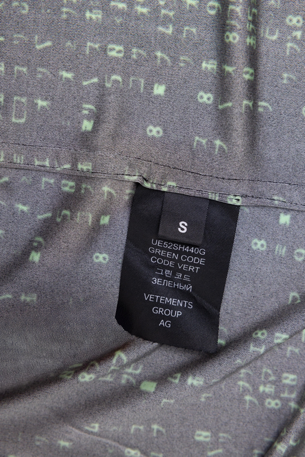 Pre-owned Vetements unisex shirt in black/green, size tag view, Green Code label and size S
