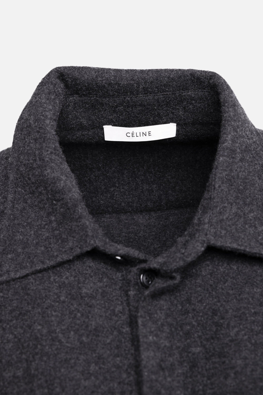 Pre-owned Celine women's long shirt in charcoal grey, label view, white woven brand label at neckline