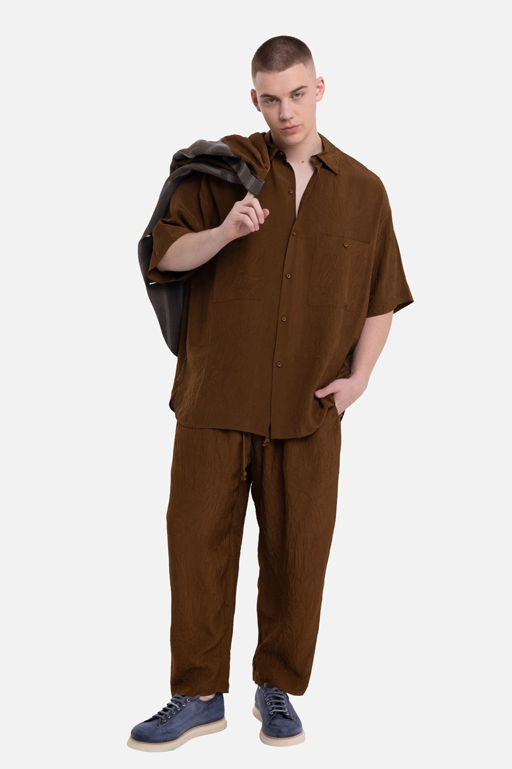 Uma Wang men's mustard short-sleeve shirt, on-model full-length view, oversized fit and crinkled texture