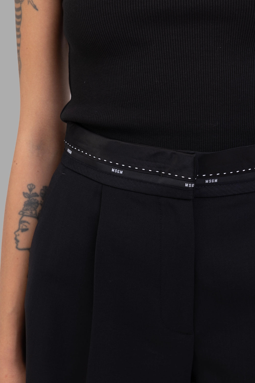 MSGM women bermuda shorts in black, waistband logo detail with dotted topstitch.