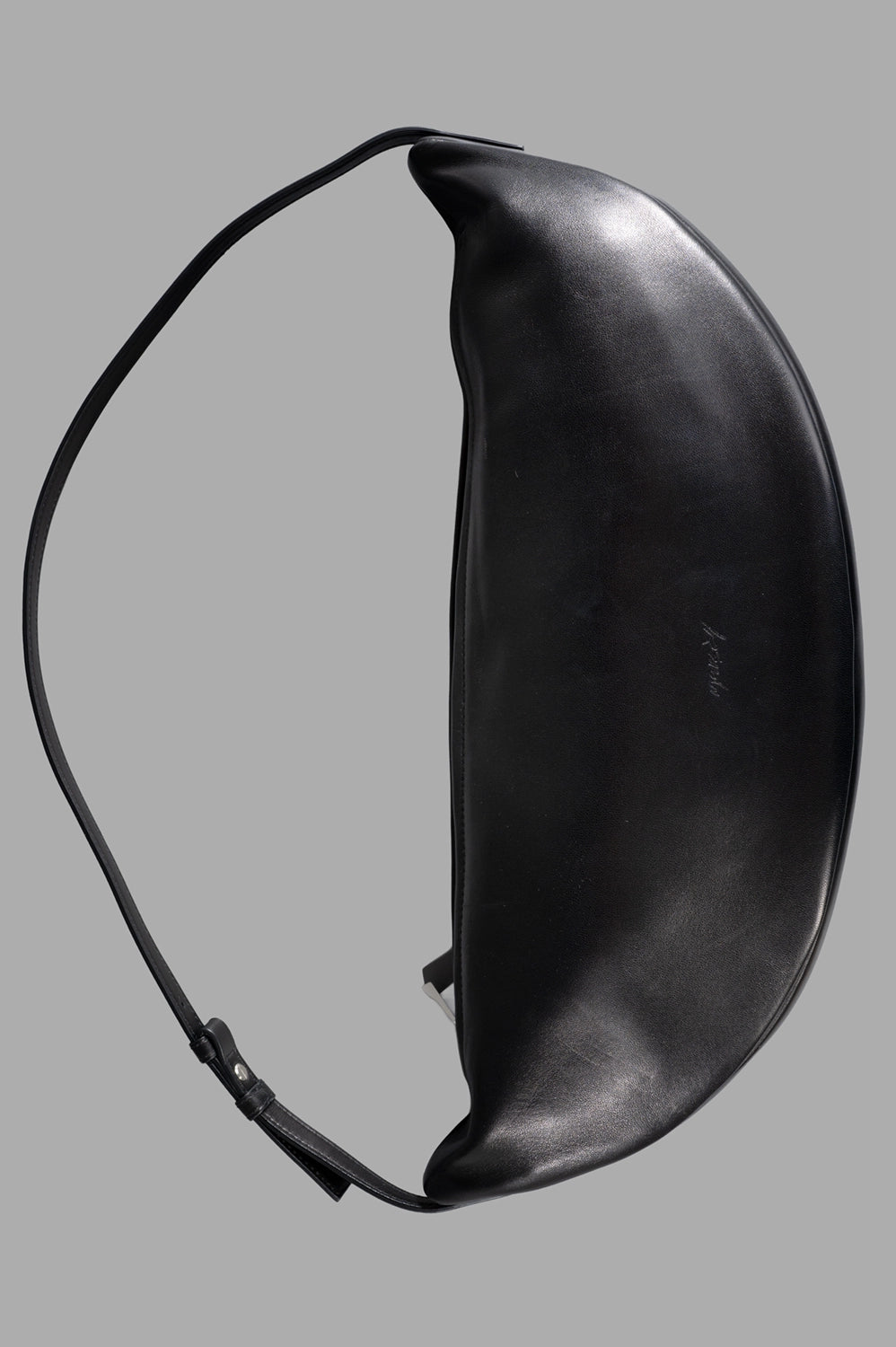 Marsèll shoulder bag in black, front view, crescent silhouette and adjustable strap