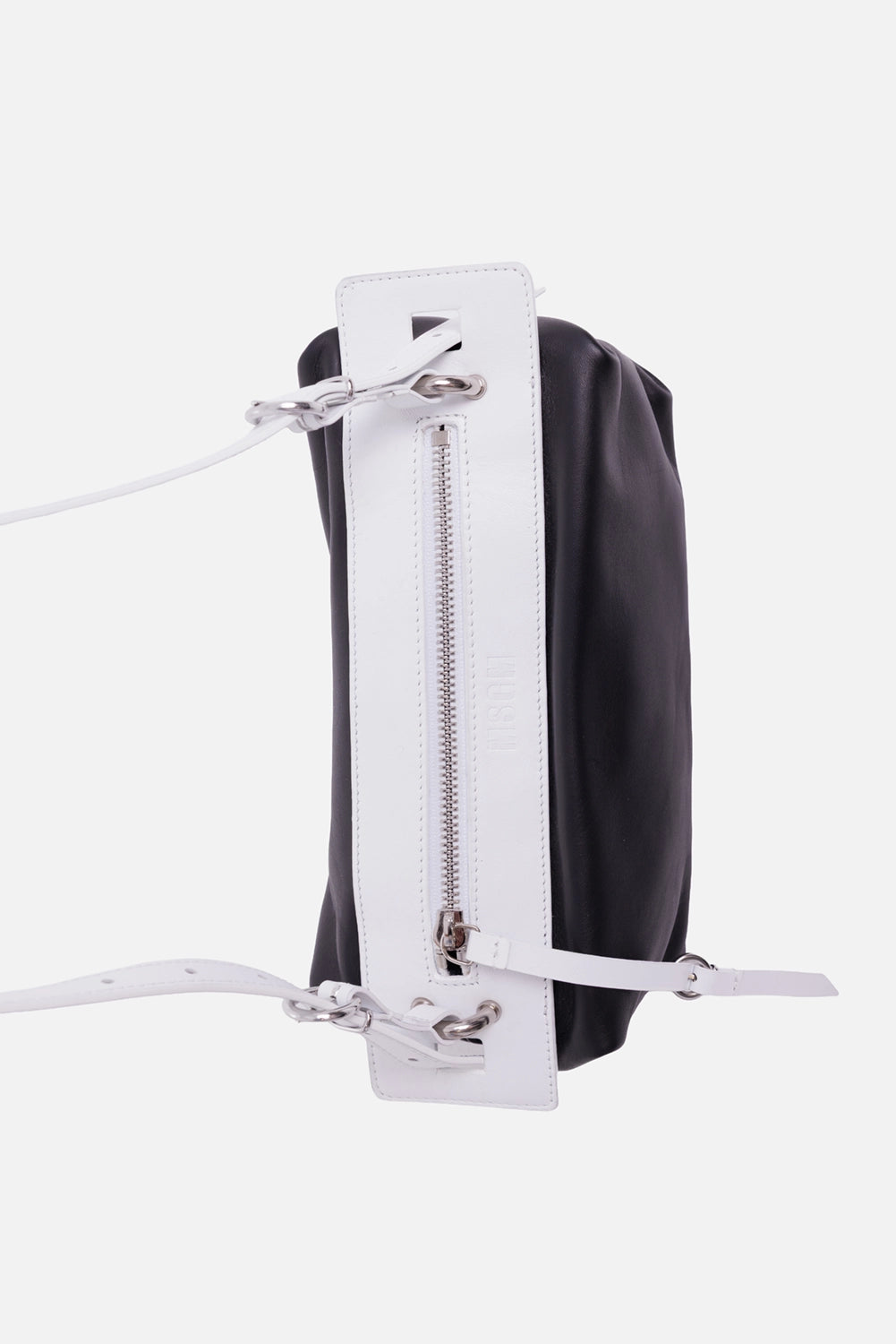 MSGM women's shoulder bag in black and white, top view with white zip panel and embossed MSGM logo