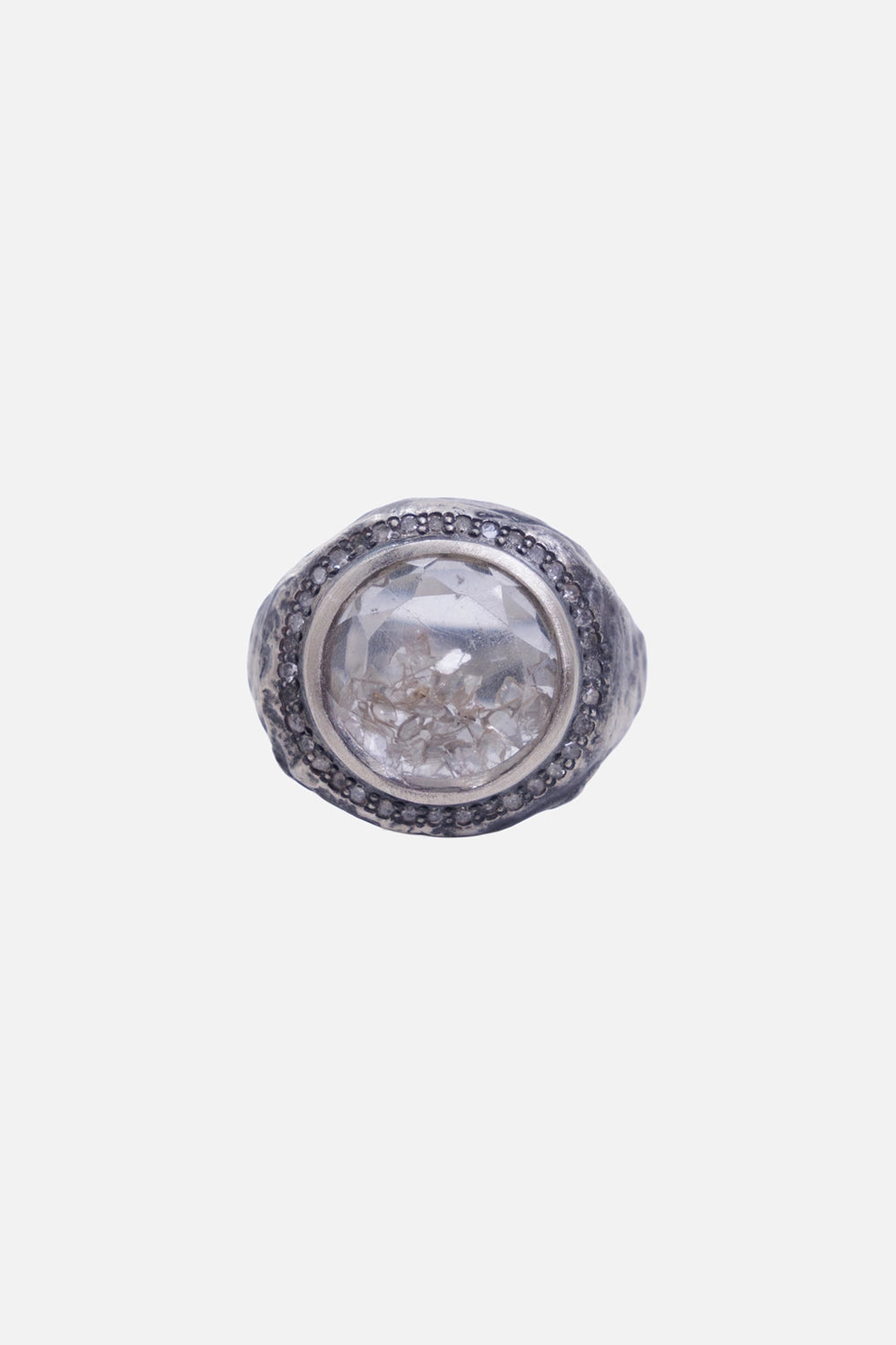 Kundo unisex signet ring in silver, front view with a clear round stone and border of small clear accents
