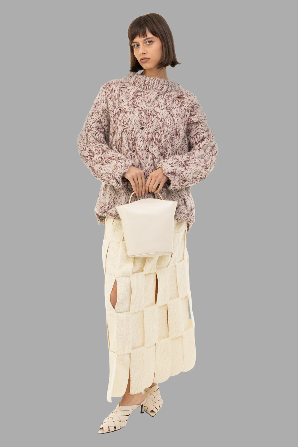 A.W.A.K.E. MODE women maxi skirt in ecru, on-model full length, open lattice rectangles and high waist.