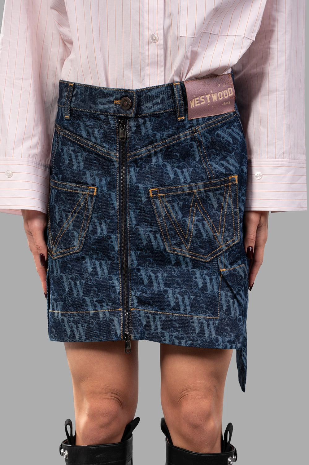 Vivienne Westwood skirt in laser denim, front view, two-way zip and patch pockets with contrast stitching
