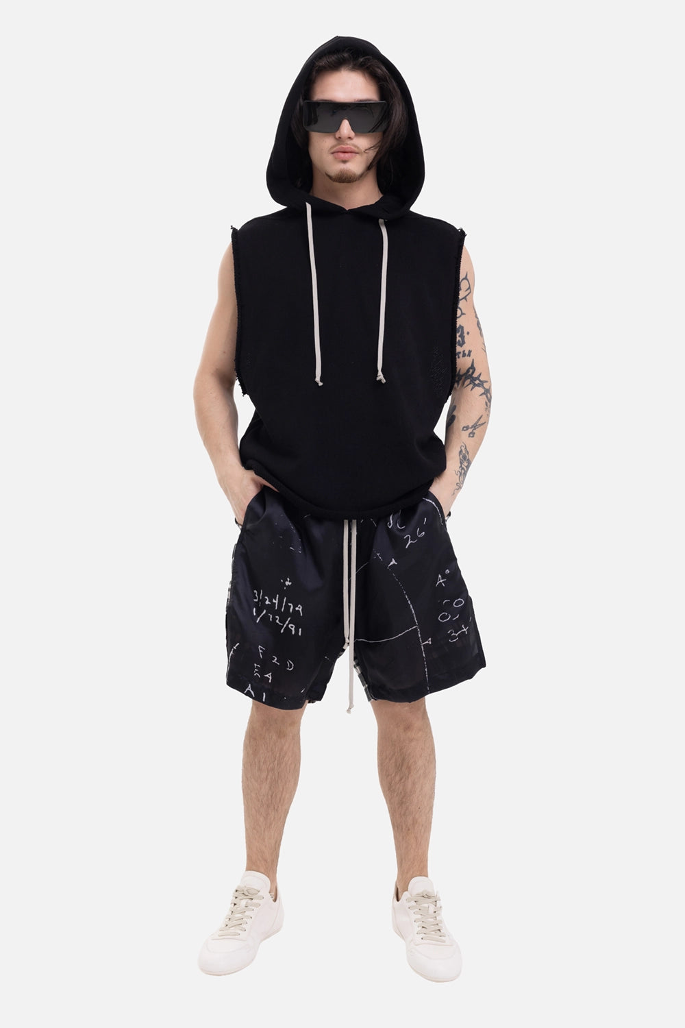 Rick Owens men's hoodie in black, on-model full-length view with hood up and long contrast drawstrings