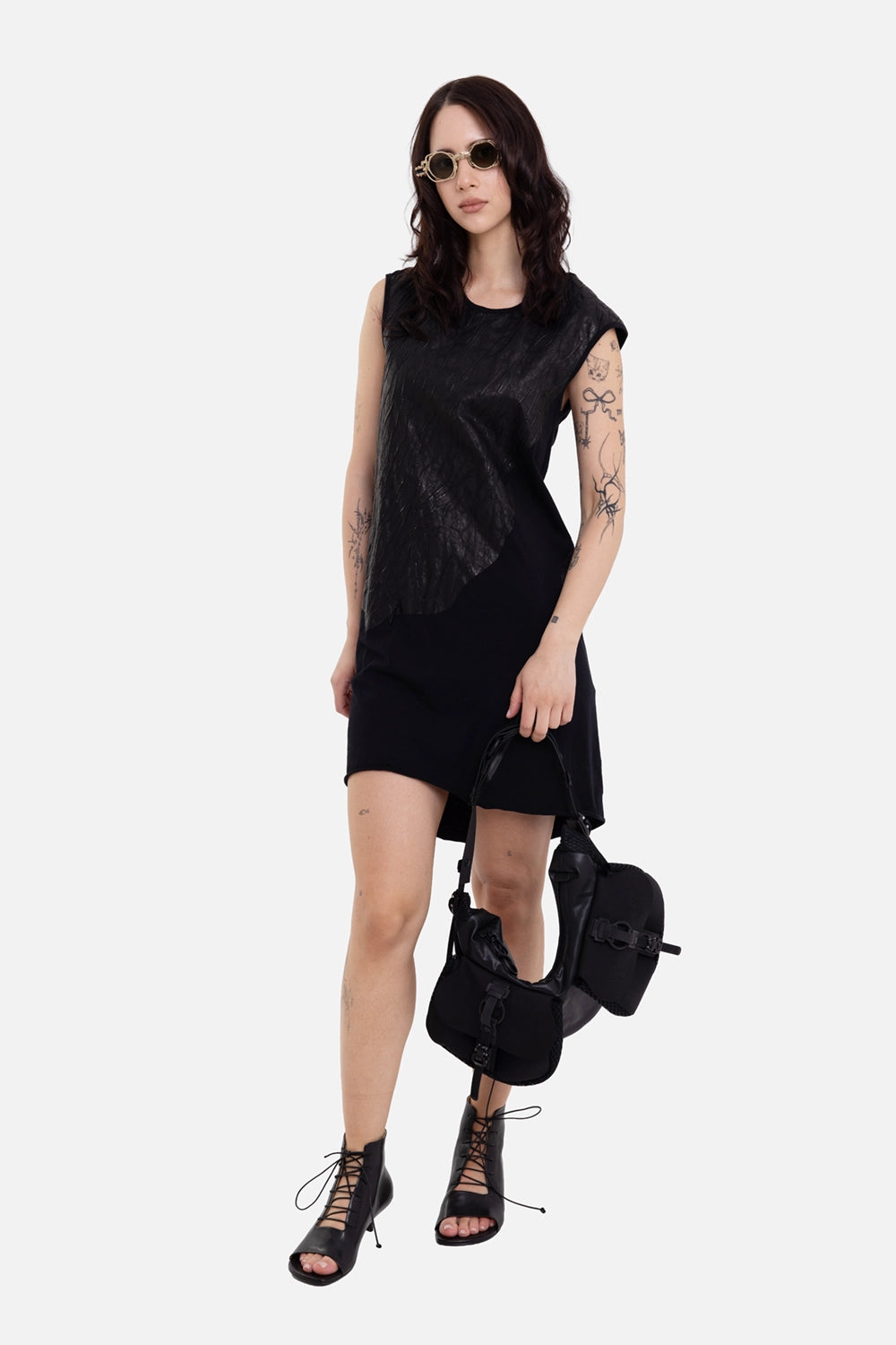 Isaac Sellam women's dress in black, on-model full length, crinkled leather panel and cap sleeves