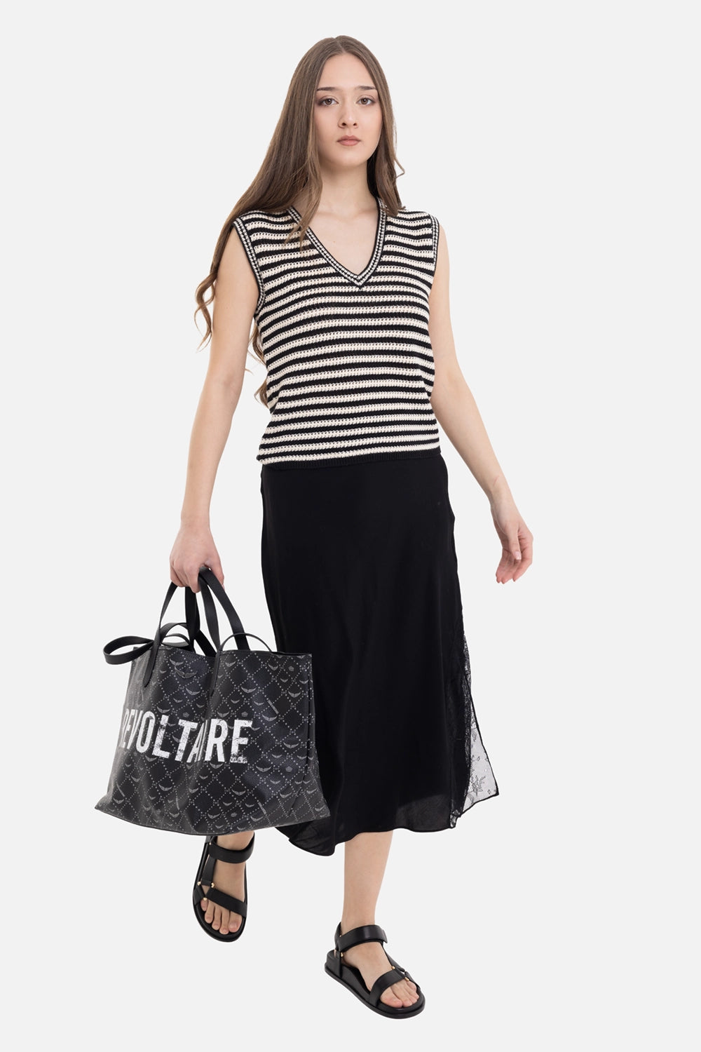 ANINE BING women's sleeveless sweater in black and ivory stripe, on-model full length, V-neck with black skirt