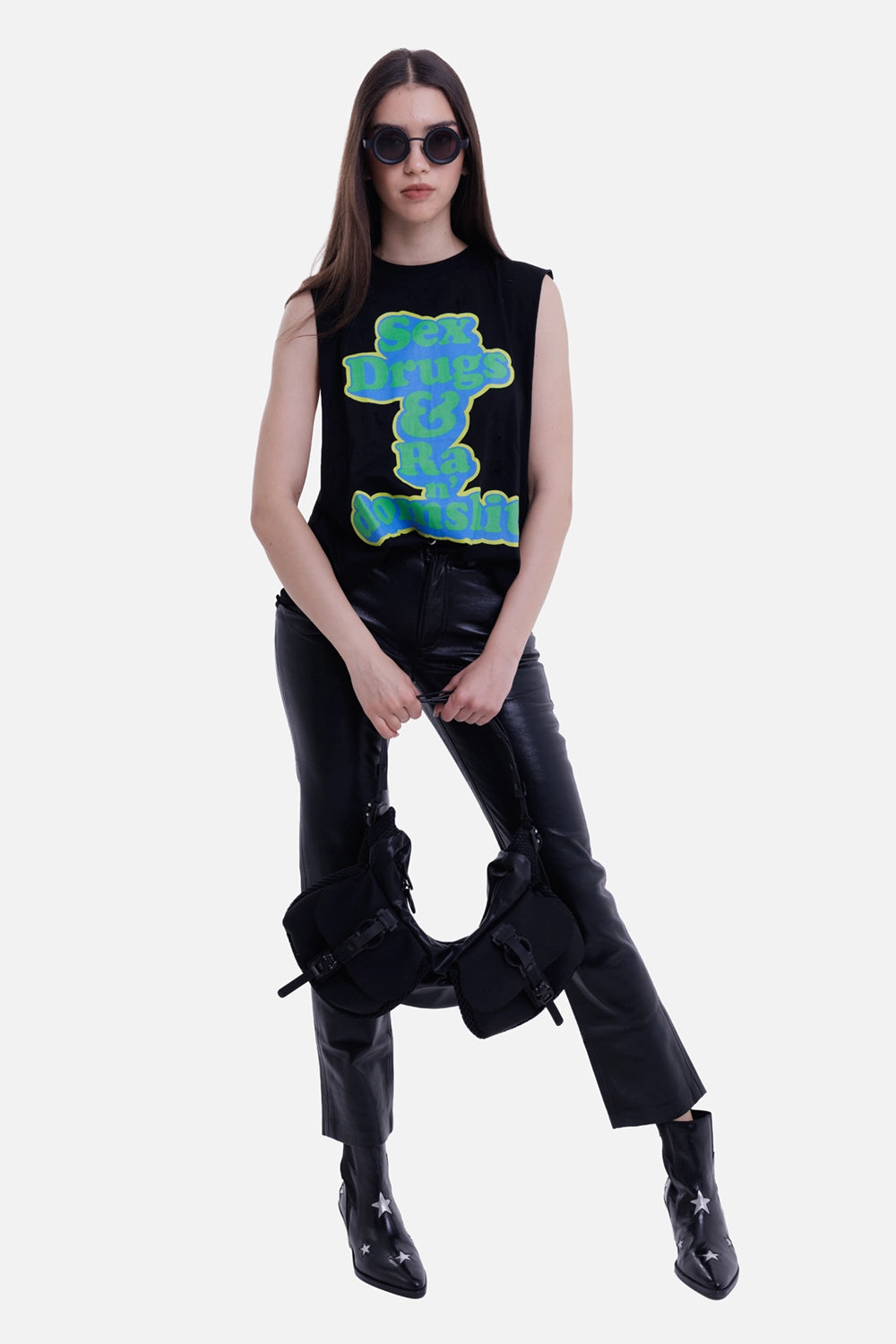 Natasha Zinko women's black sleeveless T-shirt, model view with blue and green slogan graphic