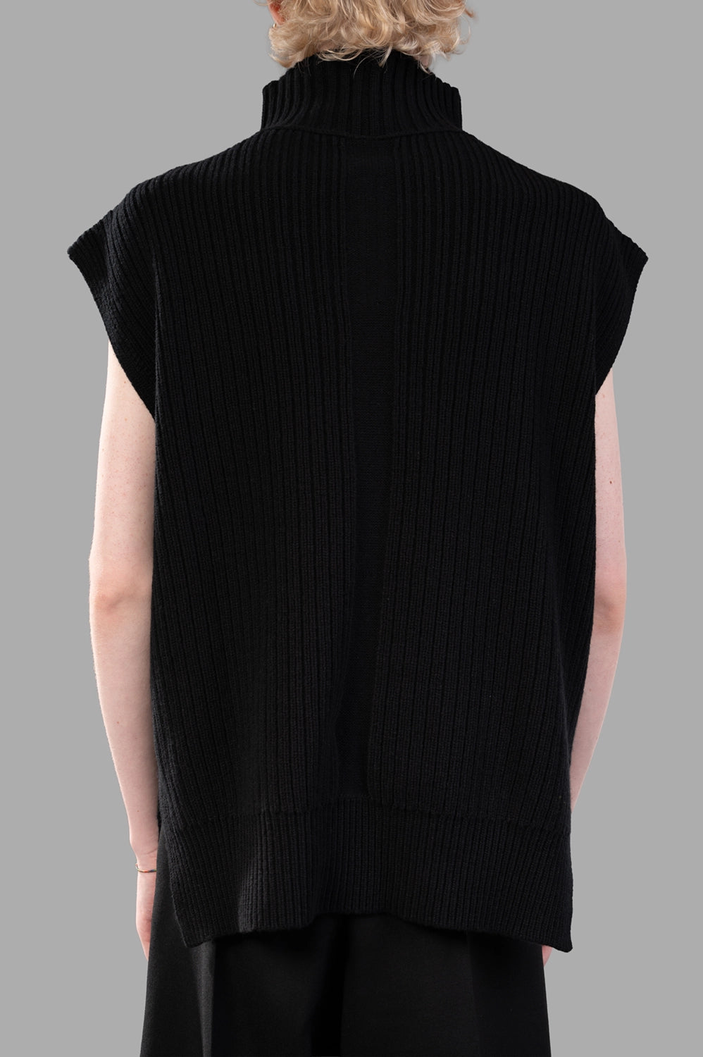 Rick Owens sleeveless turtleneck sweater in black, back view with center knit channel and wide rib hem