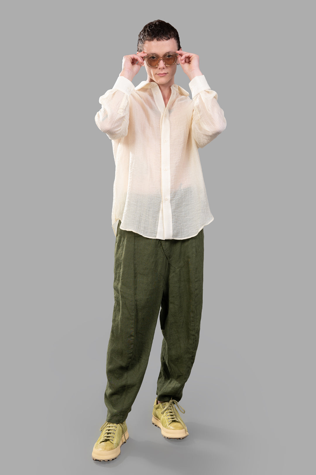 Justin Gall Crinkled Shirt, front view on model, ecru color, semi-transparent texture, relaxed fit, stylish look.