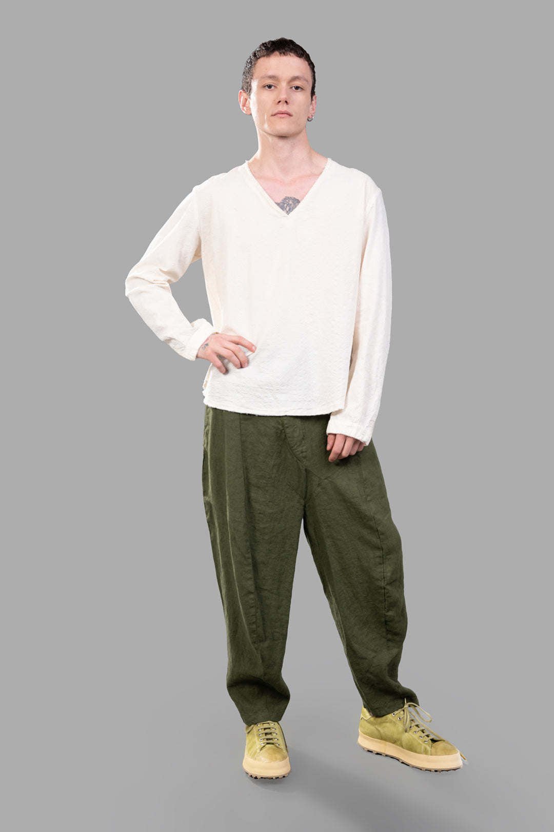 Marc Point V-neck Blouse in ecru, front view on-model, highlighting asymmetric hem and relaxed bohemian fit.