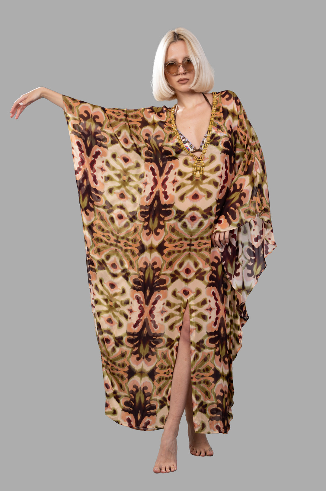Anjuna Abstract-print Kaftan Dress, front view on-model with intricate design and V-neck detail, against gray background.