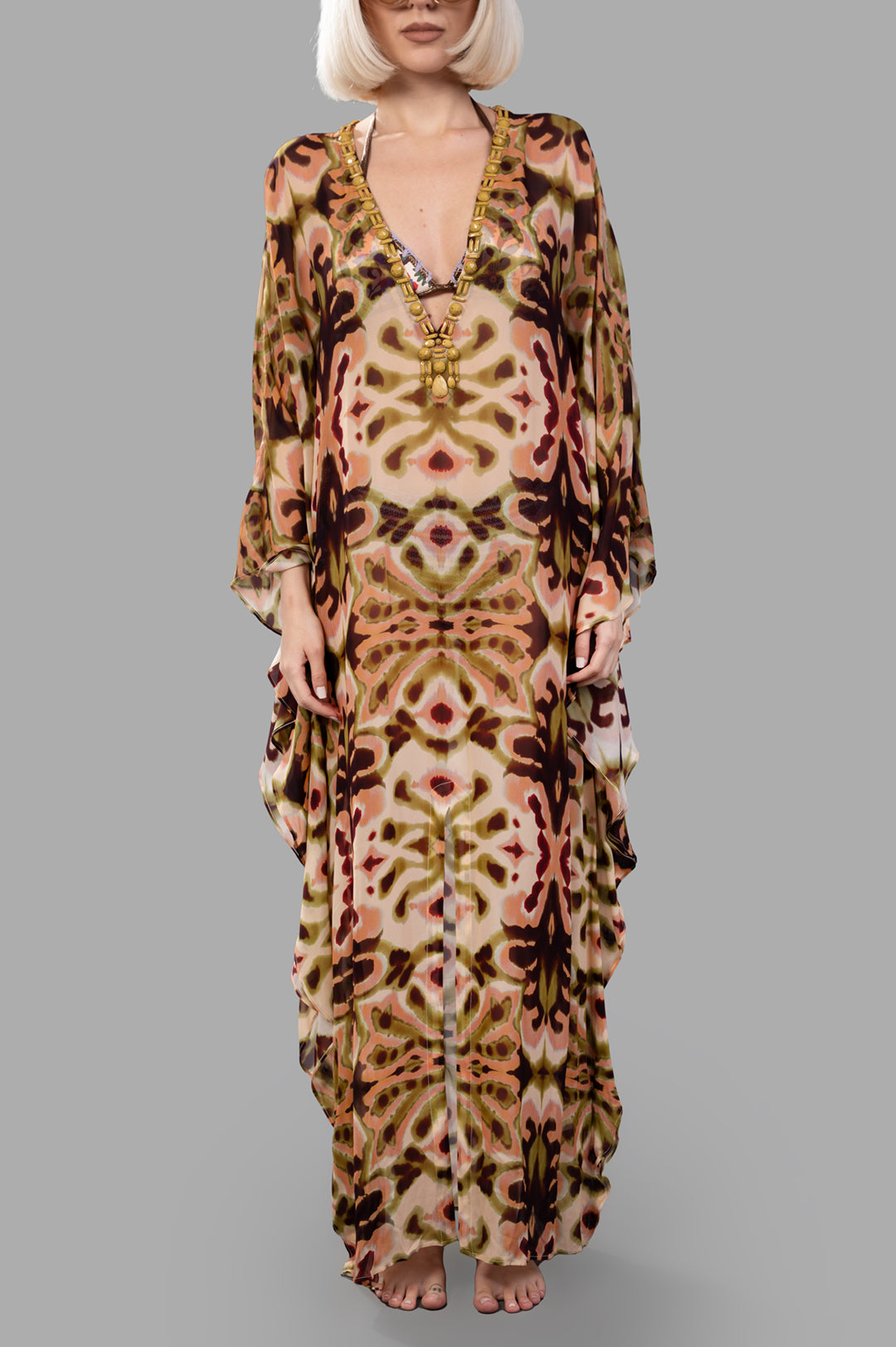 Anjuna Abstract-print Kaftan Dress on model, showcasing a vibrant design and flowing silhouette, perfect for summer.