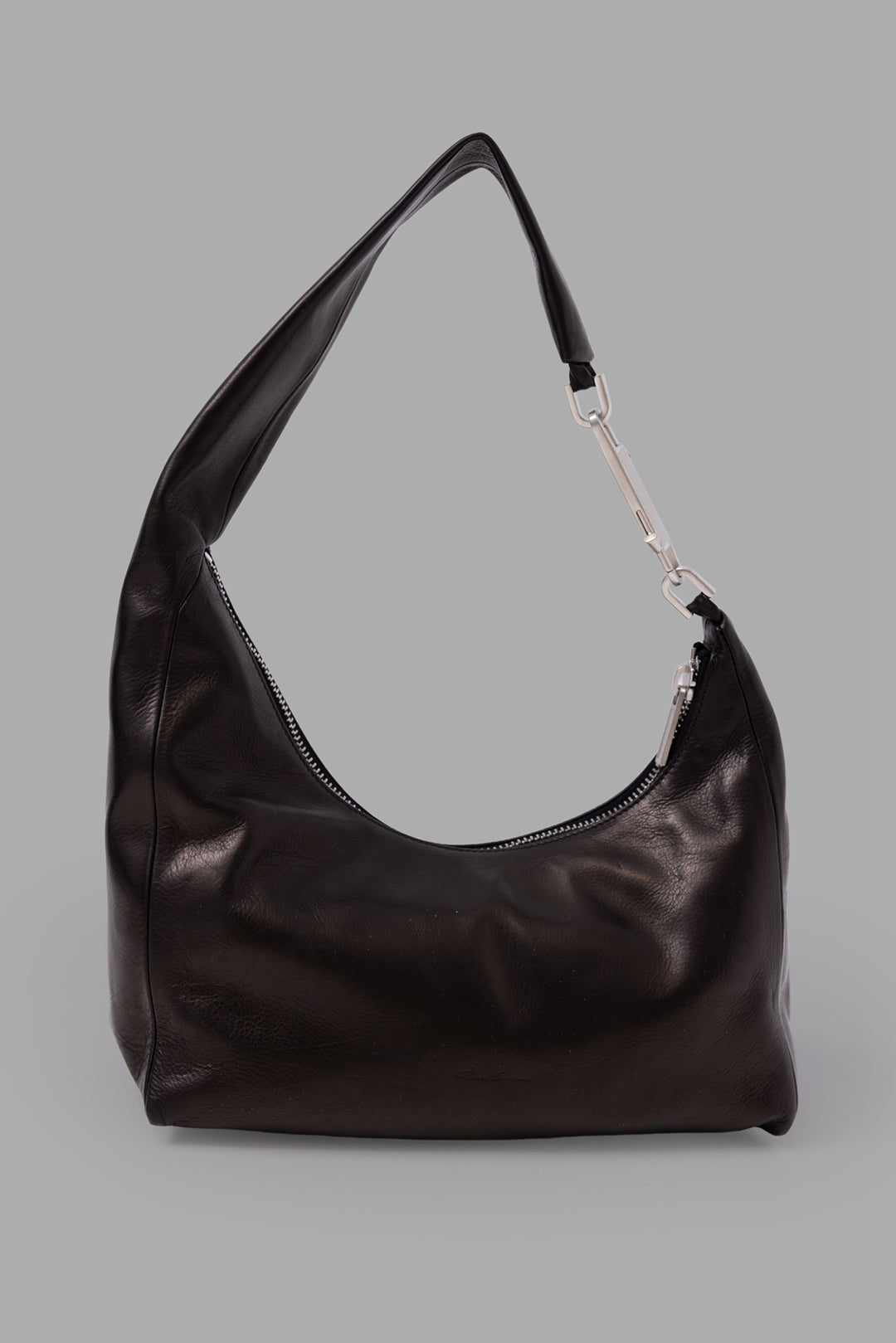 Rick Owens black small Gemini leather shoulder bag, three-quarter view showing slouchy hobo shape and top zip.