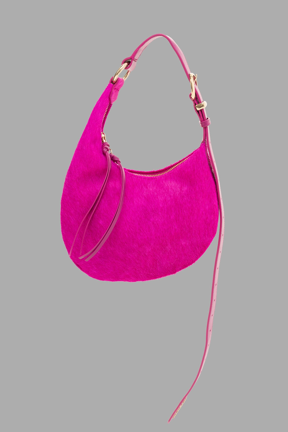 Des Phemmes women's small hobo bag in Framboise, 3/4 view, hair-on texture with gold zip and long strap tail.