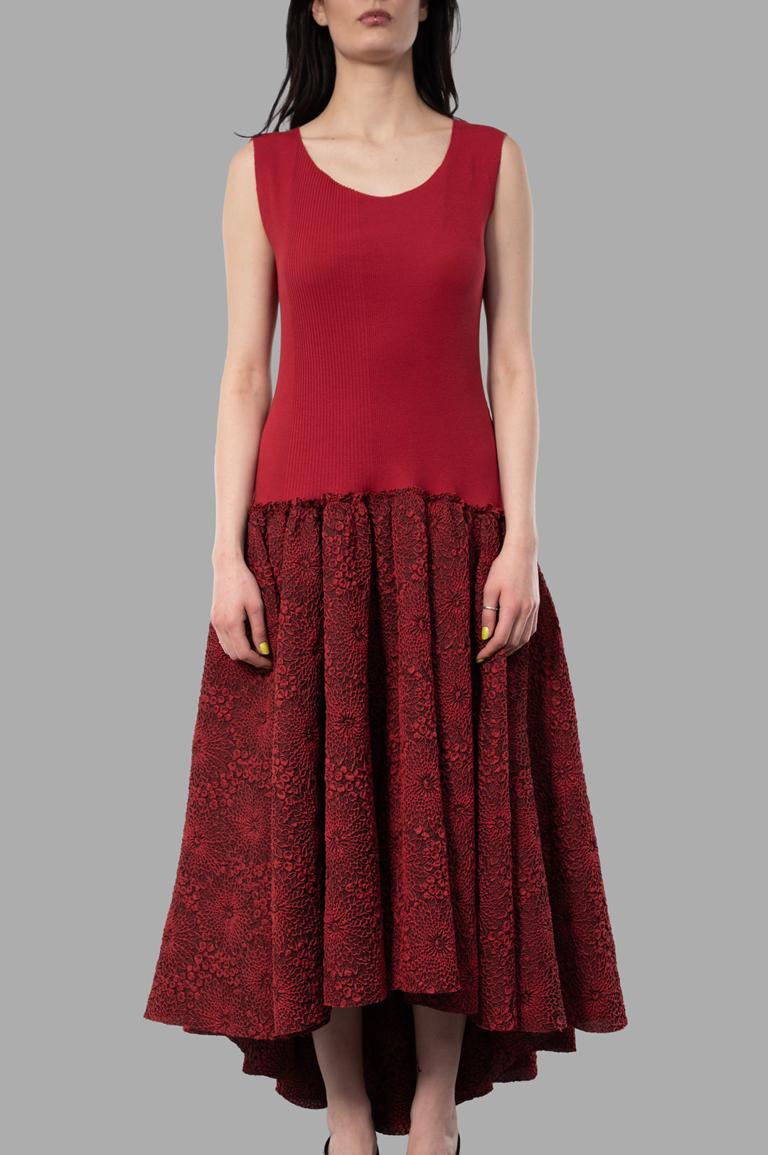 Marc Point Long Bustier Dress in Red, featuring a sleeveless top and textured maxi skirt, shown on model.