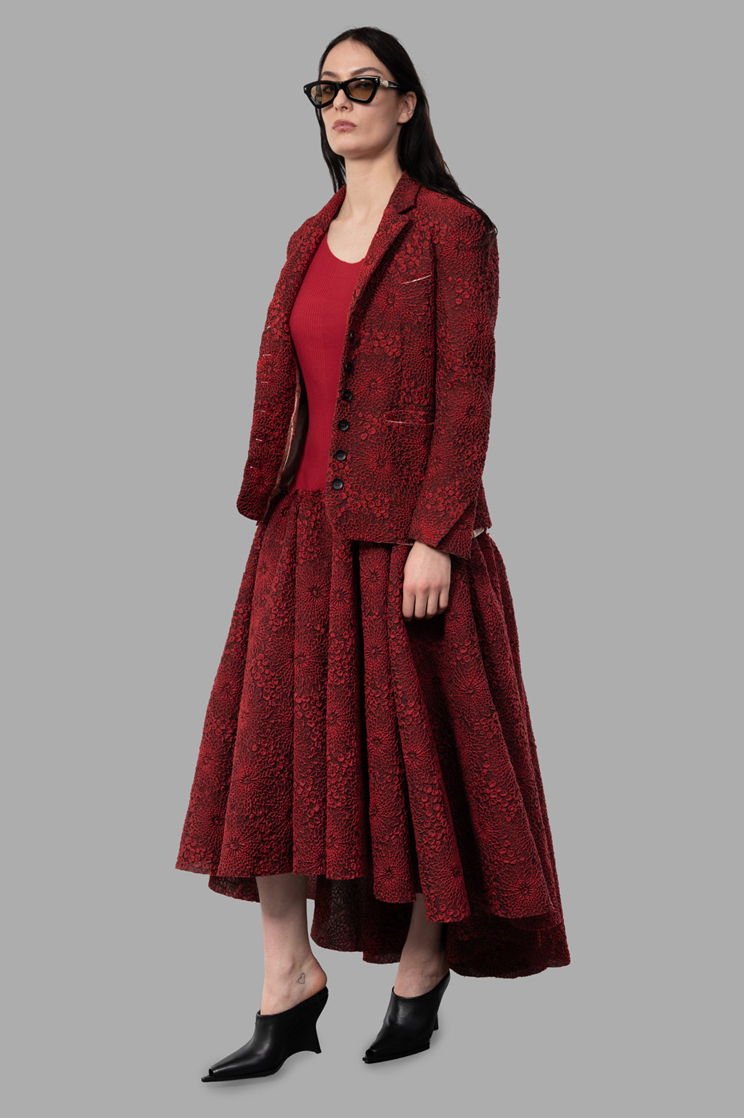 Marc Point Floral Jacket in red, side view on model, showcasing textured design, handmade in Italy, relaxed tailoring.