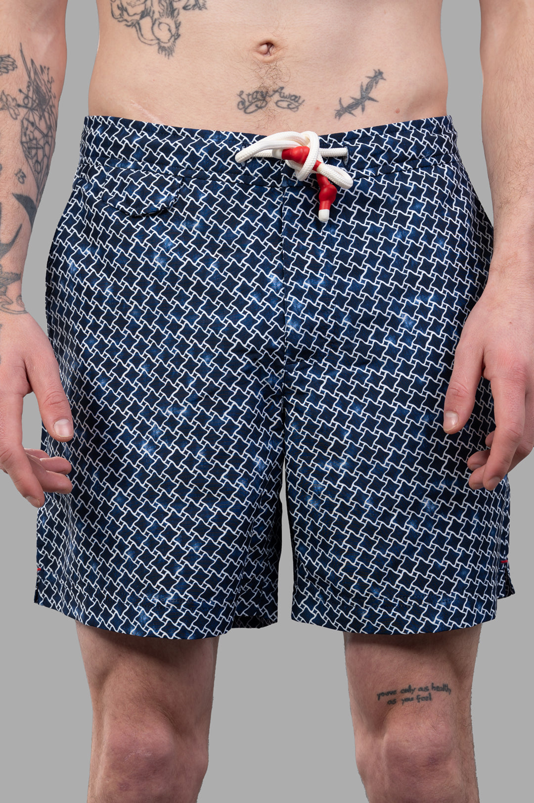 Orlebar Brown Geo Print Drawcord Swim Shorts, featuring a relaxed fit and half-elasticated waistband in blue.