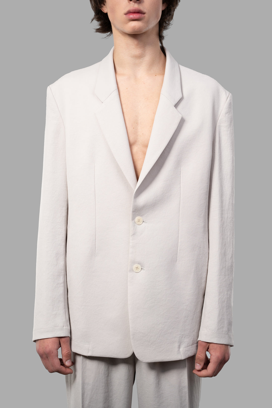 Vein. Beige Single-breasted Jacket seen from the front, featuring slim collars and three-button fastening in smooth.