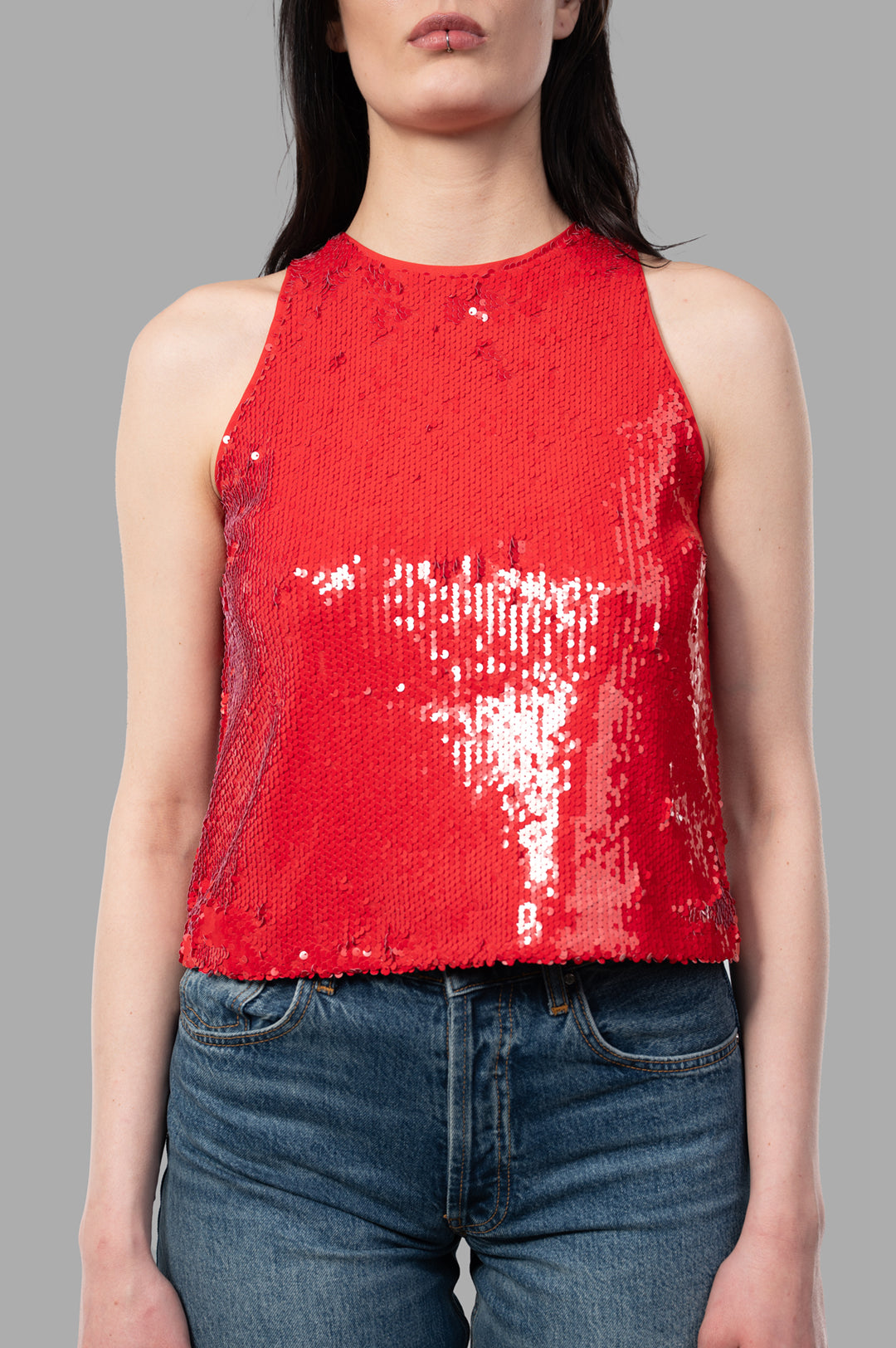MSGM Red Sequin Top featuring a close-up view, showcasing the shiny red sequins and sleeveless design on a model.