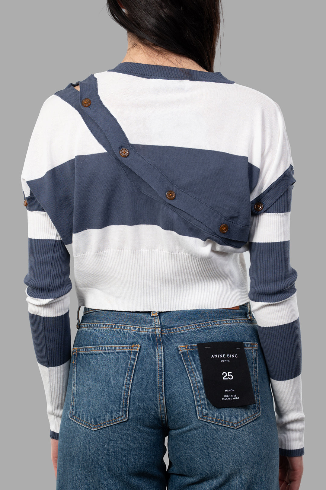 Vivienne Westwood Olivia Cardigan in blu/white, showcasing a stylish crossbody design and button details on the back.