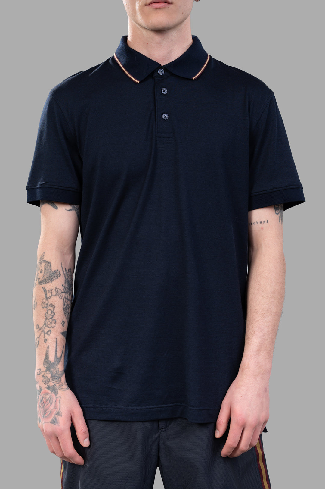 Orlebar Brown Dominic Polo Shirt in navy blue, featuring contrast tipping on collar, modeled front view for style detail.