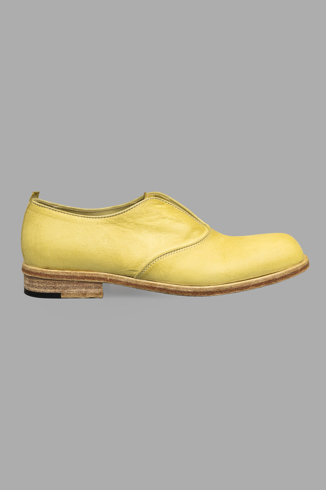 Shoto Lime Leather Shoes, side view. Handmade in Italy with natural leathers, featuring a unique yellow patina.
