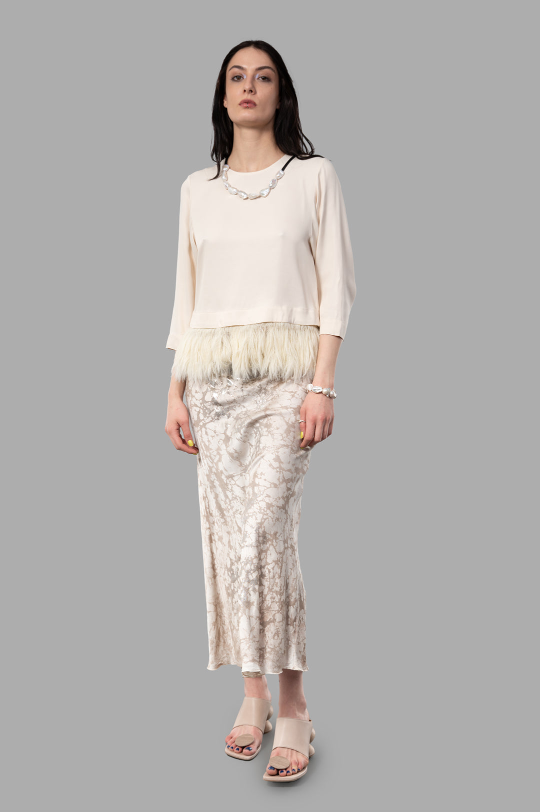 By Malene Birger Scarletts Blouse, front view, beige, with detachable feather trim, round neckline, model wearing.