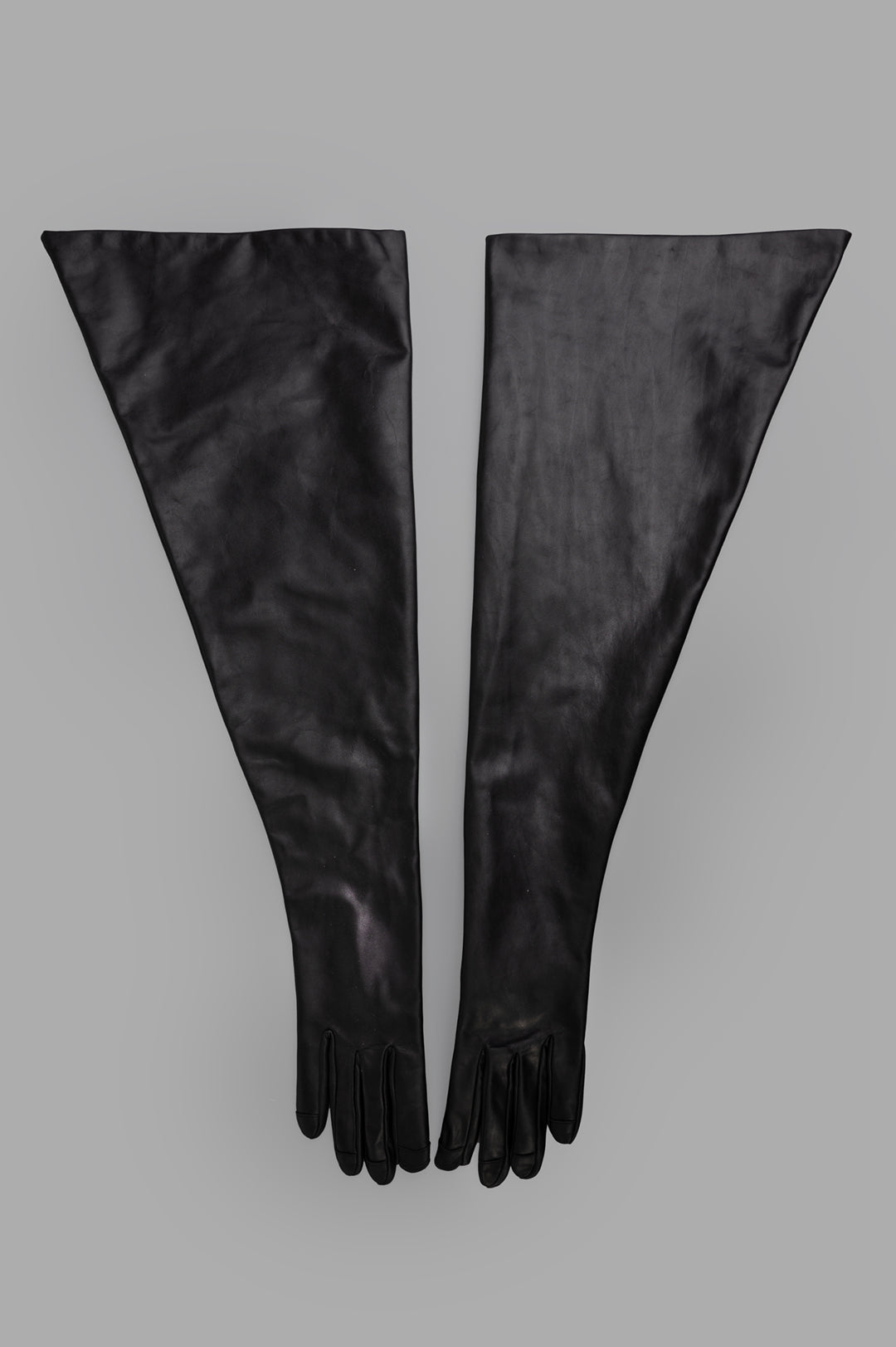 Rick Owens Hollywood Runway Gauntlets in Black, front view of calf leather, above-elbow gloves with metallic finish.