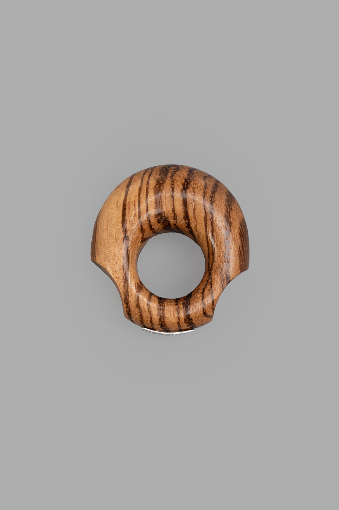 Monies Roris Ring, front view. Bold wood design showcasing natural brown tones and unique grain texture.