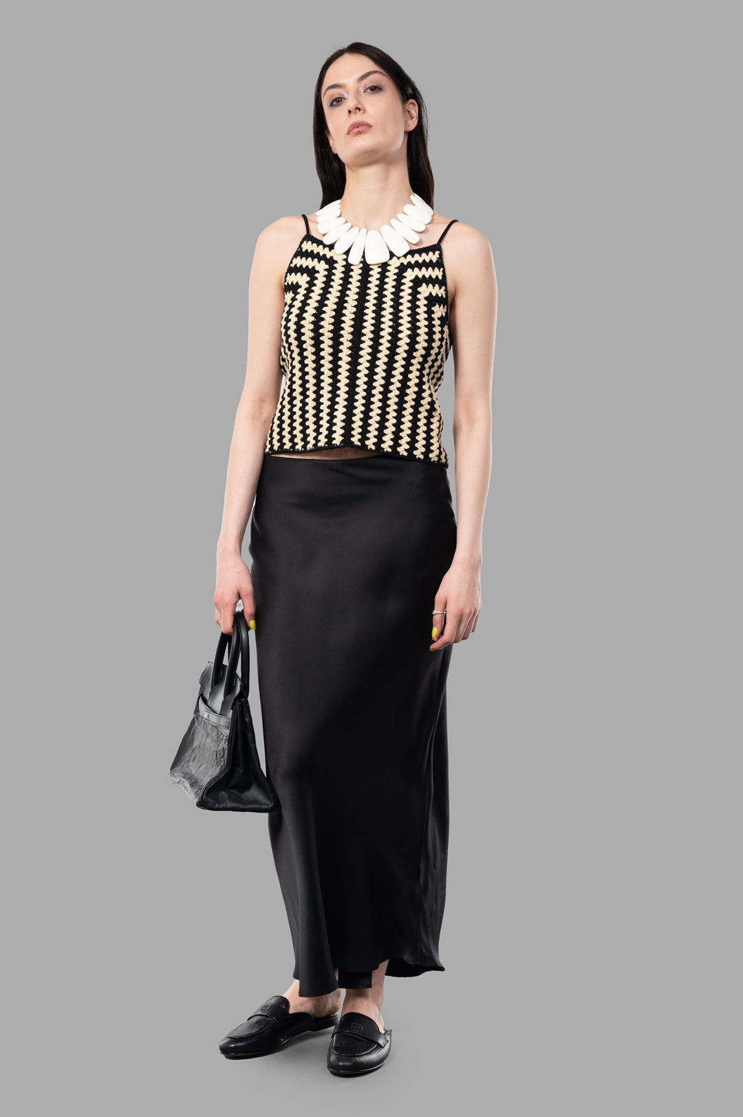 By Malene Birger Doria Organic Cotton Top modeled, beige/black crochet, front view, paired with black skirt.