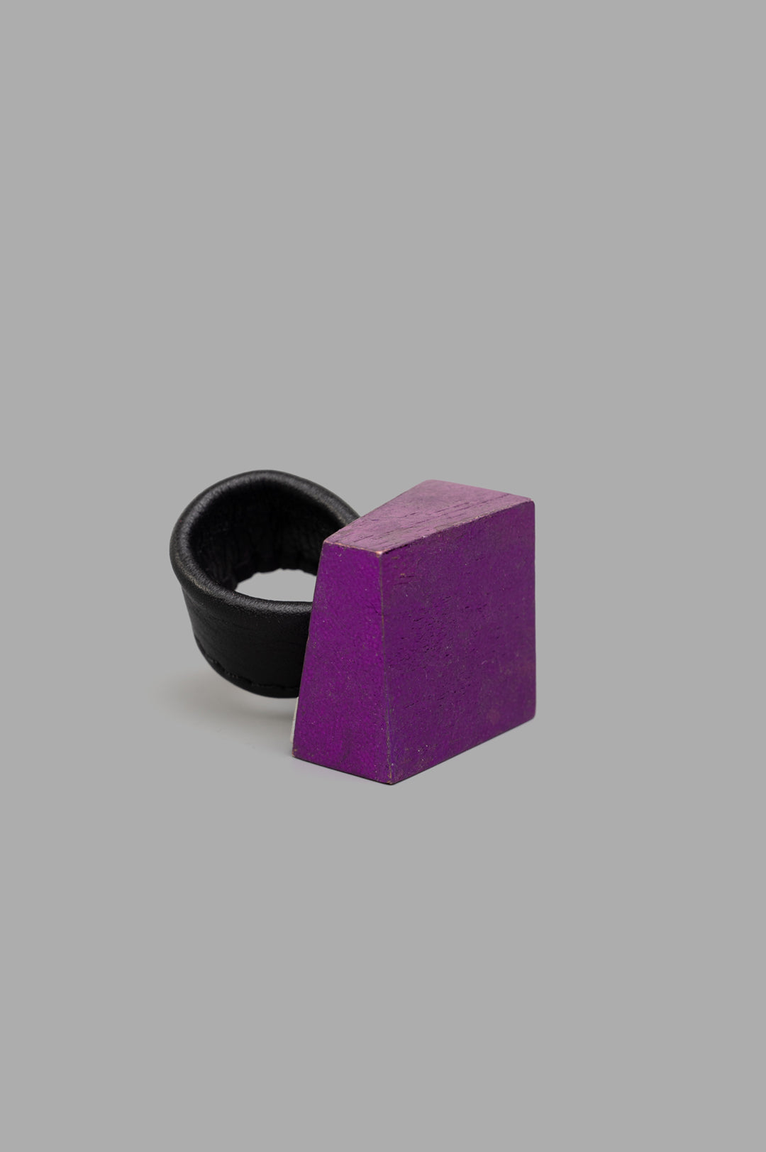 Monies Cinis Ring in Purple, front view showcasing bold wood block design and rich texture on neutral background.