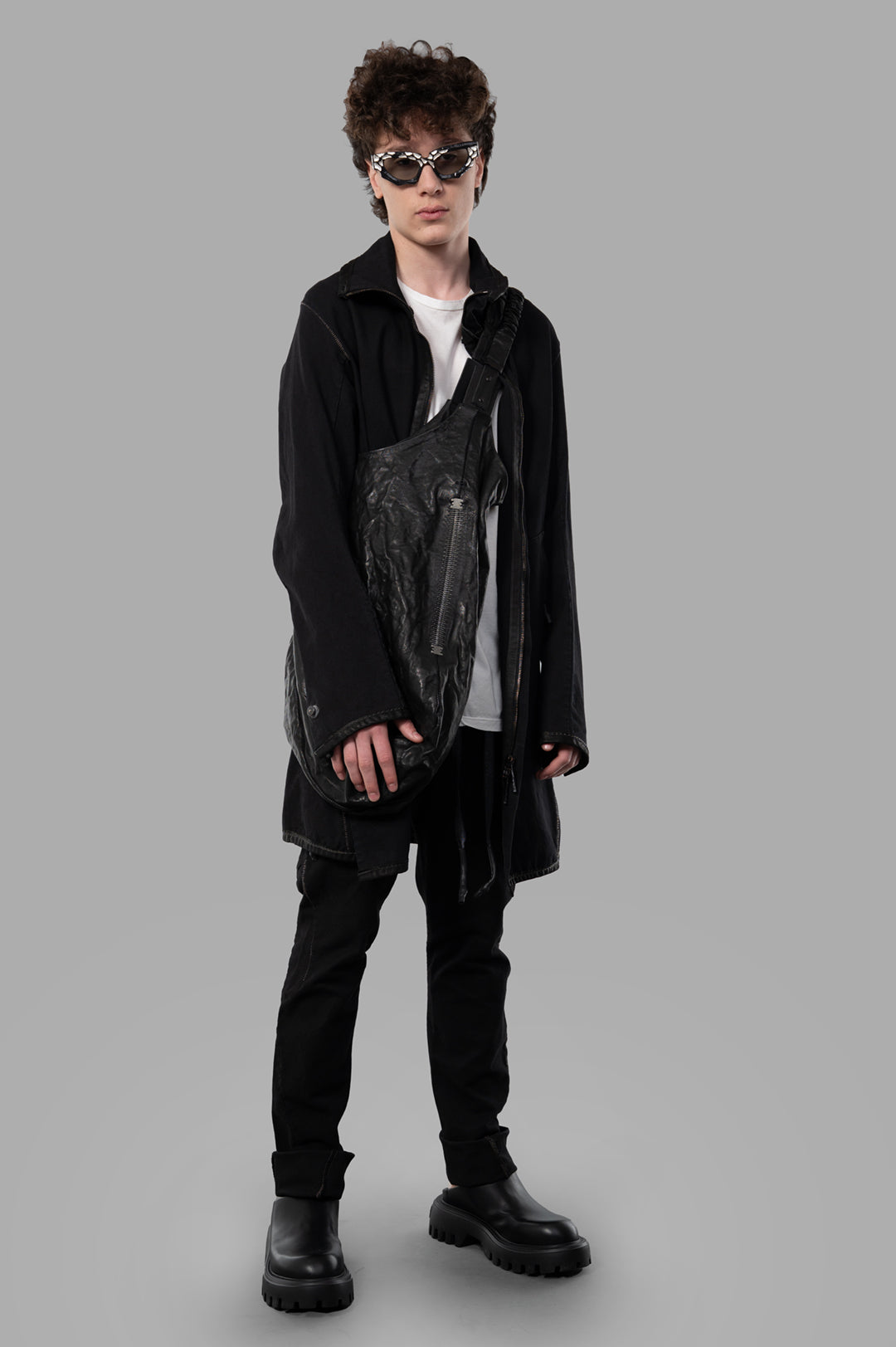 Isaac Sellam Zip-up Parka in black, on-model front view. Handmade with cotton-elastane blend, innovative craftsmanship.