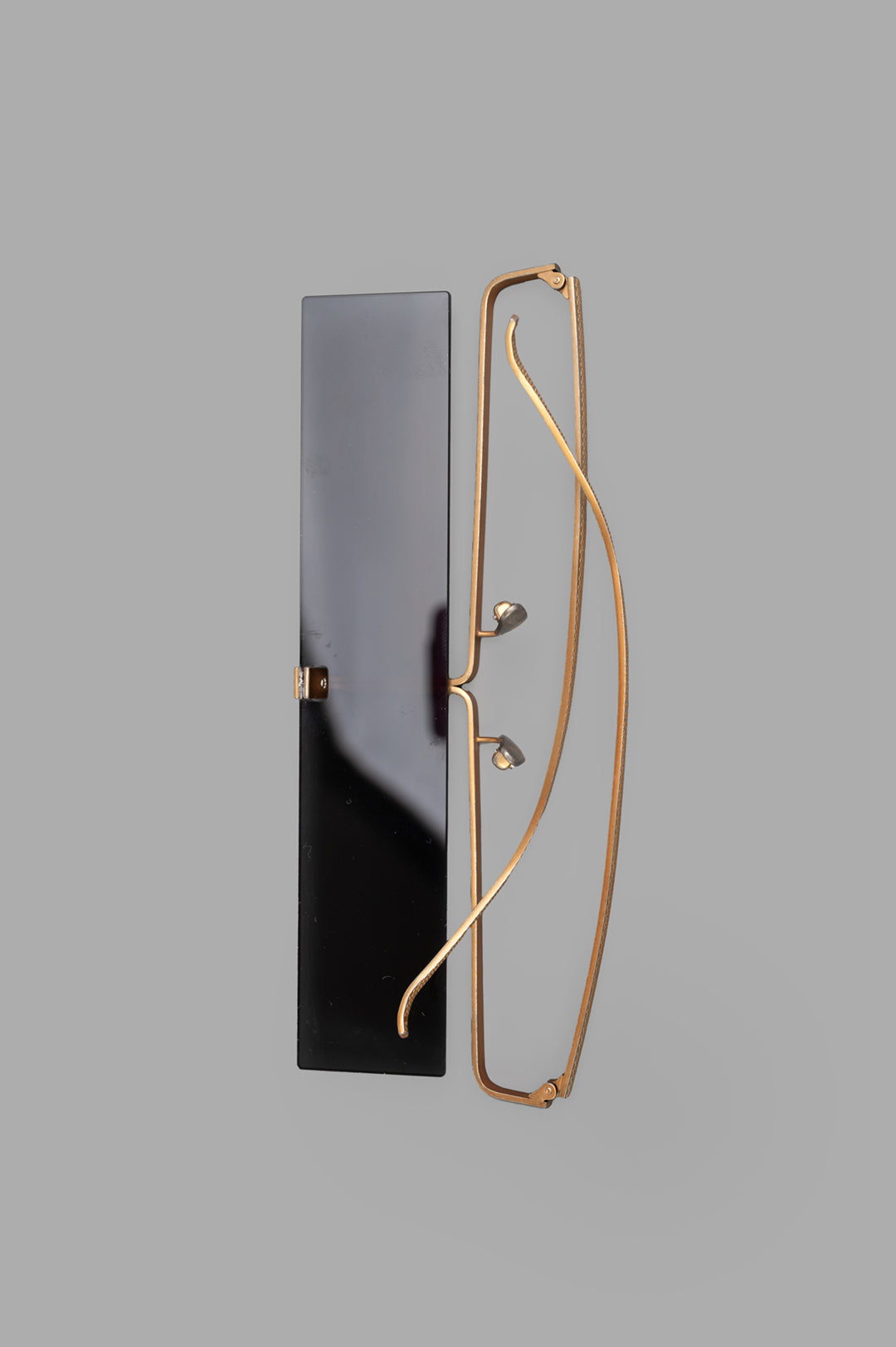 Uma Wang x Rigards Rectangular Glasses in gold, showcasing a sleek design with titanium frame and bold rectangular lenses.