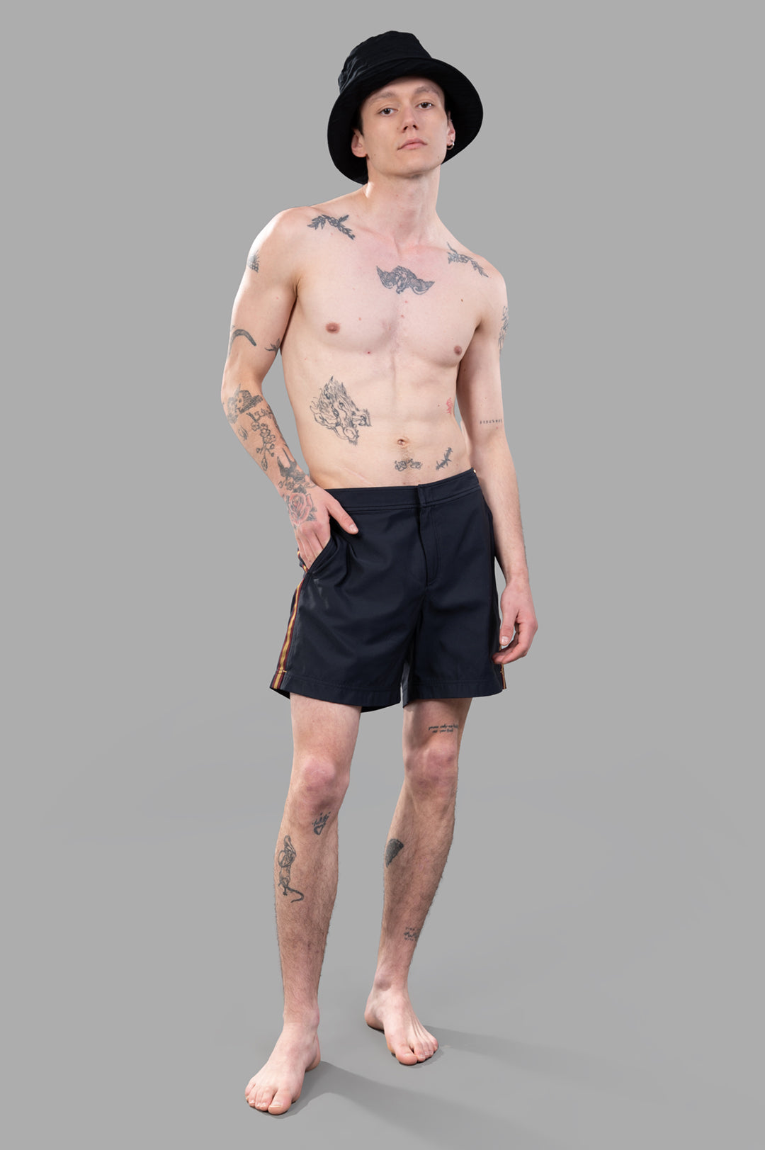 Orlebar Brown Bulldog Pique Swim Shorts, front view on-model, styled with a black bucket hat, image 1.