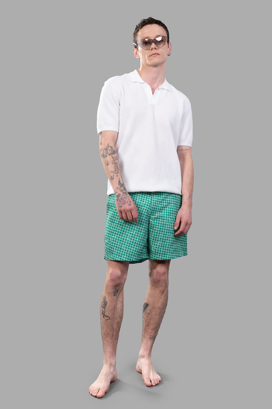 Orlebar Brown Waffle Mesh Polo Shirt in white, front view on model, Italian-knit texture with open resort placket.