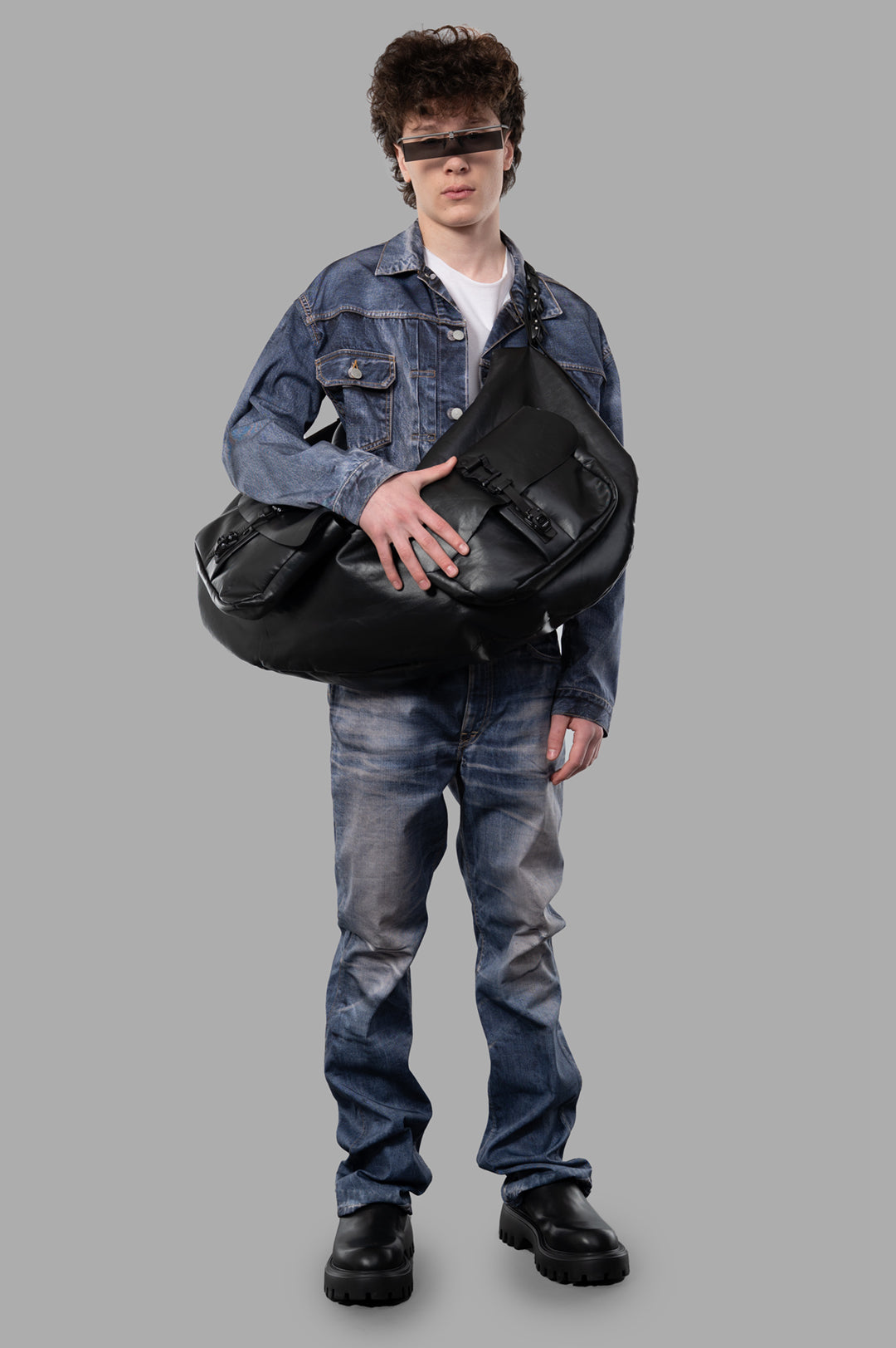 Junya Watanabe x Levi's Nylon Twill Jacket in blue denim, shown on model with chest flap pockets and buttoned-cuff sleeves.