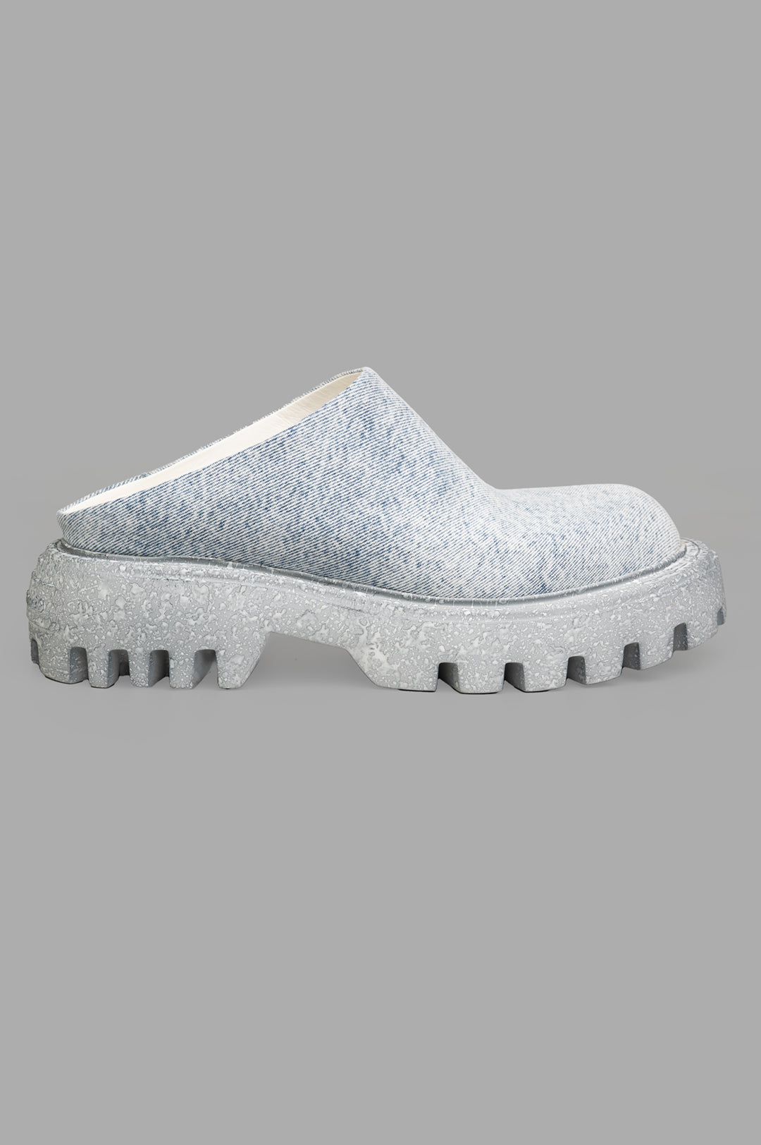 Mattia Capezzani Denim Mules side view showing rugged sole and jeans-textured upper, handcrafted in Italy for chic style.