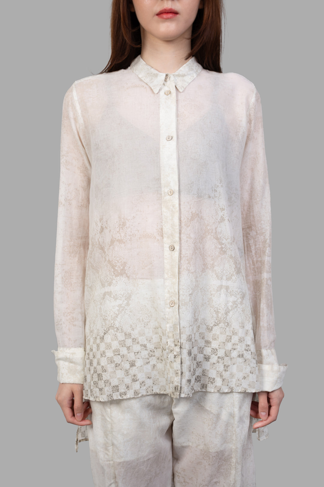Masnada Plaster Shirt: Ecru, loose-fitting shirt with translucent fabric, subtle graphic detailing, model front view, 100%.