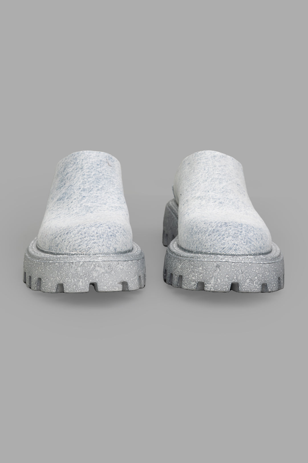 Mattia Capezzani Denim Mules showcasing a unique front view with textured denim upper and sturdy gray outsole.