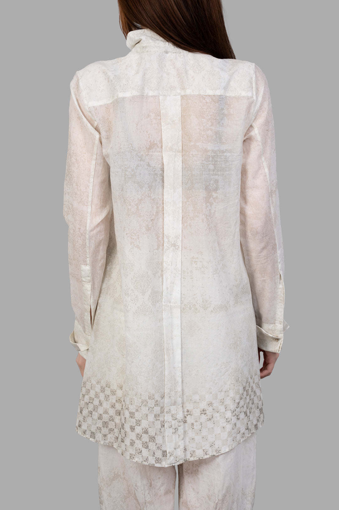 Masnada Plaster Shirt, ecru, back view showcasing its loose fit, subtle graphic details, and translucent cotton fabric.
