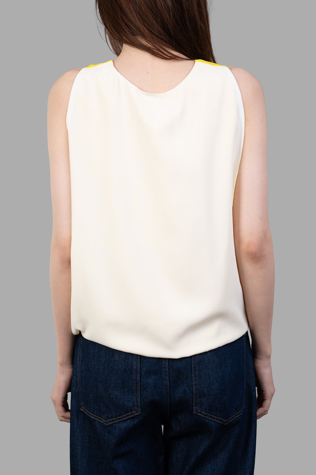 MSGM Color-block Top in White/Yellow, showcasing the back view, sleeveless design, and soft silk-acetate texture.