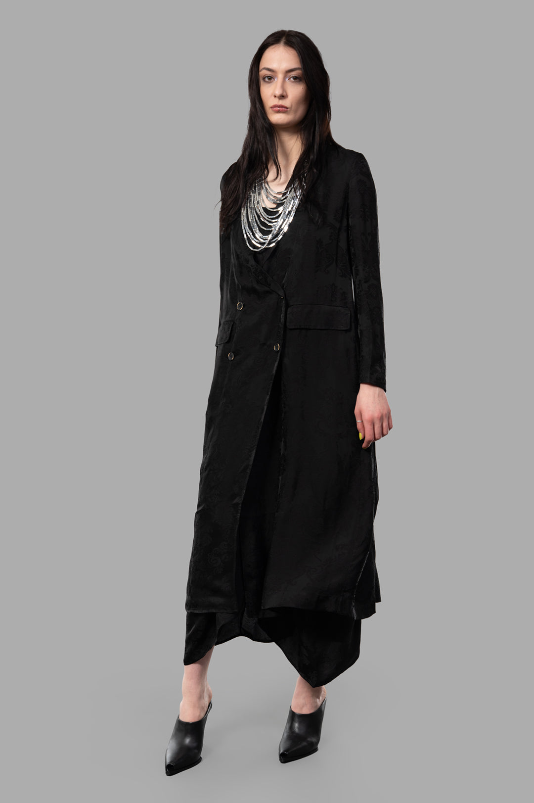 Uma Wang Double-breasted Floral Coat in black, front view on model, showcasing antique-inspired textile elegance.