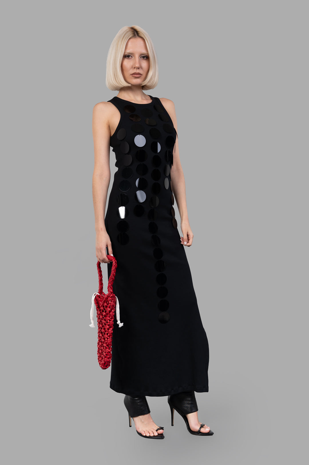 MSGM Disc-embellished Dress in black, front view on-model, showing maxi-length and textured detailing.