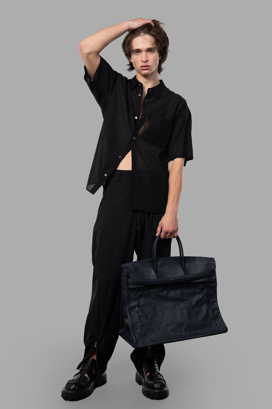 Attachment Textured Resort Shirt, black with white buttons, on-model front view, short sleeves, vertical stripe texture.