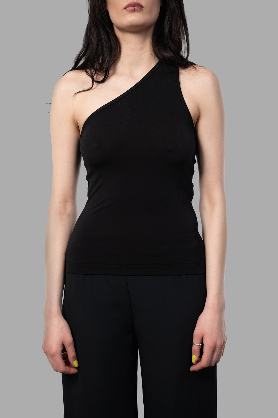 By Malene Birger Jaklin Top in black, featuring an asymmetrical one-shoulder design, on model showcasing flattering fit.